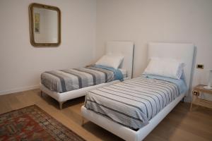 Elegante Alloggio con Parcheggio Gratuito