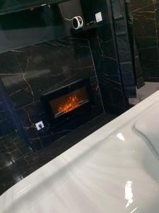 Love Room luxe avec jacuzzi privé