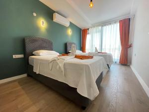 Karaoz Global Houses