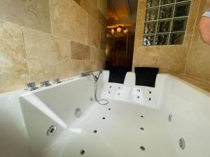 Maisons de vacances Maison de ville avec spa prive : photos des chambres