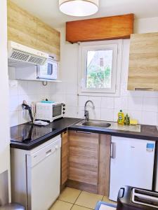 Appt T3 calme bord du lac avec piscine