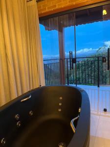 Vila Italliana Chalés - Chalé Trento