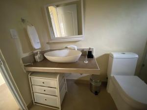 2BR & 2 WR ocean view Suite at Villa Costa Verde in Playa Cofresi, Puerto Plata, with a pool, big veranda, and a rooftop terrace