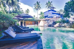 FabExpress Coco Goa Resort - Nr Baga Night Market - ホテル, Saligao