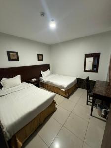 Al Thanaa Alraqi Furnished Apartments