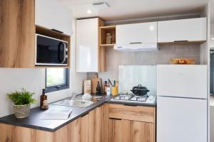 Campings Camping du Lac de Pouzauges a 15- du PuyduFou : photos des chambres