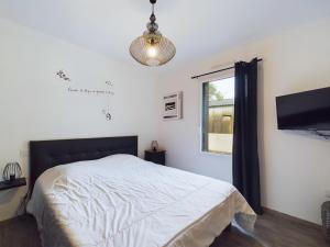 Maisons de vacances Maison avec jardin et jacuzzi pour 8 personnes : photos des chambres