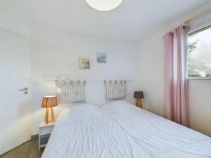 Maisons de vacances Maison avec jardin et jacuzzi pour 8 personnes : photos des chambres