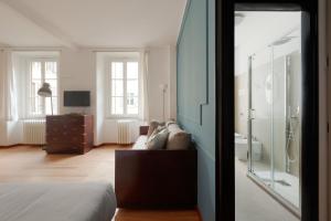 GuestHost - SantAmbrogio & Duomo Elegant Studio