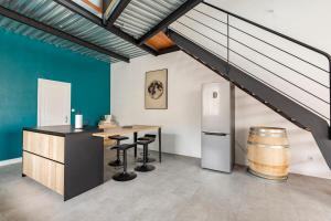 Appartements Loft chaleureux : photos des chambres
