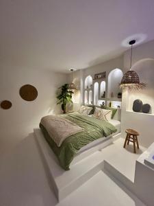 Appartements Bali Suite - Spa Jacuzzi : photos des chambres