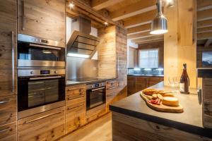 Chalets Les Couadzous Samoens Centre, Sauna, Jacuzzi, 6 chambres, 7 salles de bains, 16 pers 250 m2 : photos des chambres