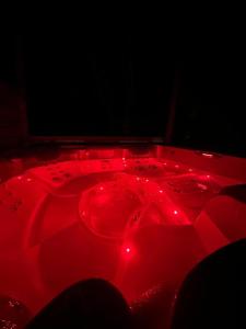 Appartements Ancienne ecole avec Jacuzzi prive : photos des chambres