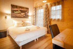 Chalets Les Couadzous Samoens Centre, Sauna, Jacuzzi, 6 chambres, 7 salles de bains, 16 pers 250 m2 : photos des chambres
