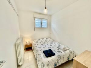 Maisons de vacances Escapade a Royan - A 5min de la gare jardin : photos des chambres