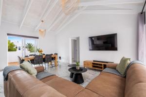 Sunlit Oasis Ocean & Golf Retreat by Host Agents