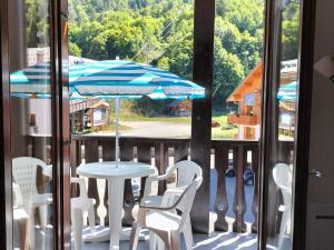 Studio cabine 4 pers 3* exposé Sud-Est avec balcon - FR-1-263-61