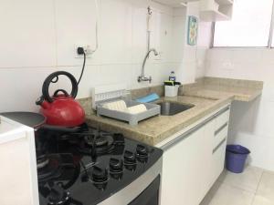 Apto em Santos com AR e Wi-Fi na rua da praia