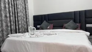 Millennium Suites - Comfy Rooms - Džhánsí