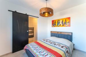 Appartements Appartement avec Jacuzzi Sauna : photos des chambres