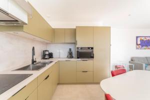 Appartements Appartement avec Jacuzzi Sauna : photos des chambres