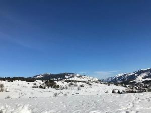 Appartements Appartement accueillant avec vue montagne, 25 m² : photos des chambres
