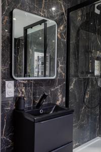 Appartements Evasion romantique avec jacuzzi : photos des chambres