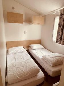 Campings Mobil-home 3ch le Per Malou Camping Les Clarines : photos des chambres