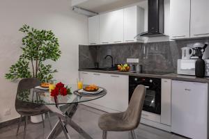 Appartements Suite avec jacuzzi & terrasse : photos des chambres
