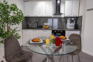 Appartements Suite avec jacuzzi & terrasse : photos des chambres