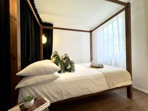 Chic Marble Arch with 100 inch Cinema & Premium Mattress, by The Design Traveller