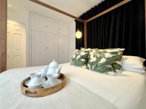 Chic Marble Arch with 100 inch Cinema & Premium Mattress, by The Design Traveller