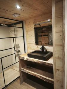Appartements Ferme perce-neige sauna et jacuzzi : photos des chambres