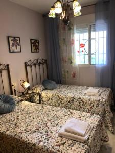 Bonito apartamento con jardín, piscina y aparcamiento gratuito