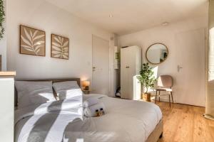 Appartements La Suite Creme - Metro D - Gare de Venissieux : photos des chambres