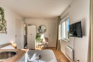 Appartements La Suite Creme - Metro D - Gare de Venissieux : photos des chambres