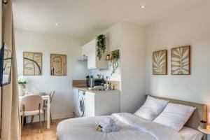 Appartements La Suite Creme - Metro D - Gare de Venissieux : photos des chambres