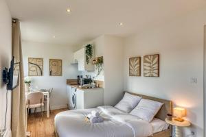 Appartements La Suite Creme - Metro D - Gare de Venissieux : photos des chambres