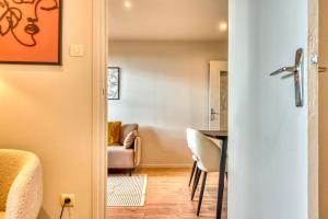 Appartements Le Panoramique - Grand T2 metro B Oullins : photos des chambres