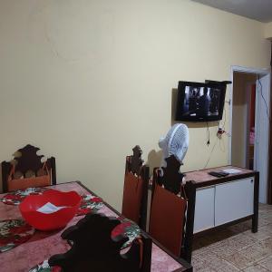 Quarto aconchegante no guarujá-pitangueiras-com garagem