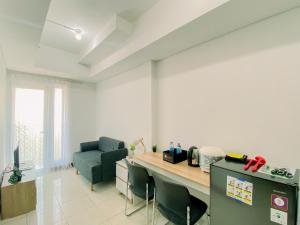Good and Homey 1BR at Boutique Kemayoran Apartment By Travelio