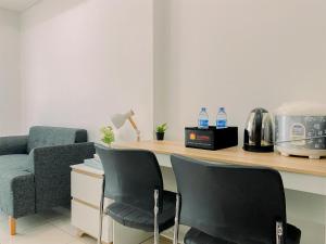 Good and Homey 1BR at Boutique Kemayoran Apartment By Travelio