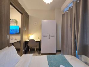 1BR Condotel with Balcony at FAME Residences #FM46