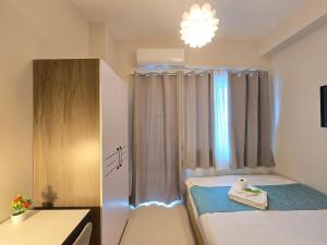 1BR Condotel with Balcony at FAME Residences #FM46