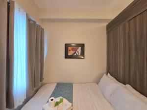 1BR Condotel with Balcony at FAME Residences #FM46