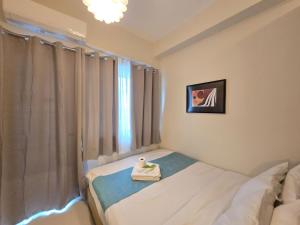 1BR Condotel with Balcony at FAME Residences #FM46