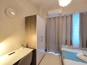 1BR Condotel with Balcony at FAME Residences #FM46