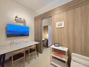 1BR Condotel with Balcony at FAME Residences #FM46