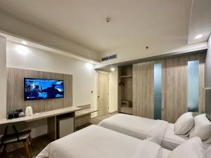 Phòng Hai Giường Đơn Loại Sang (Deluxe Twin Room)
