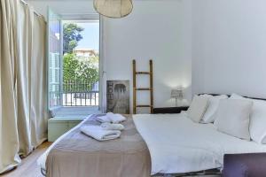 Appartements BOHEME AP4449 By Riviera Holiday Homes : photos des chambres